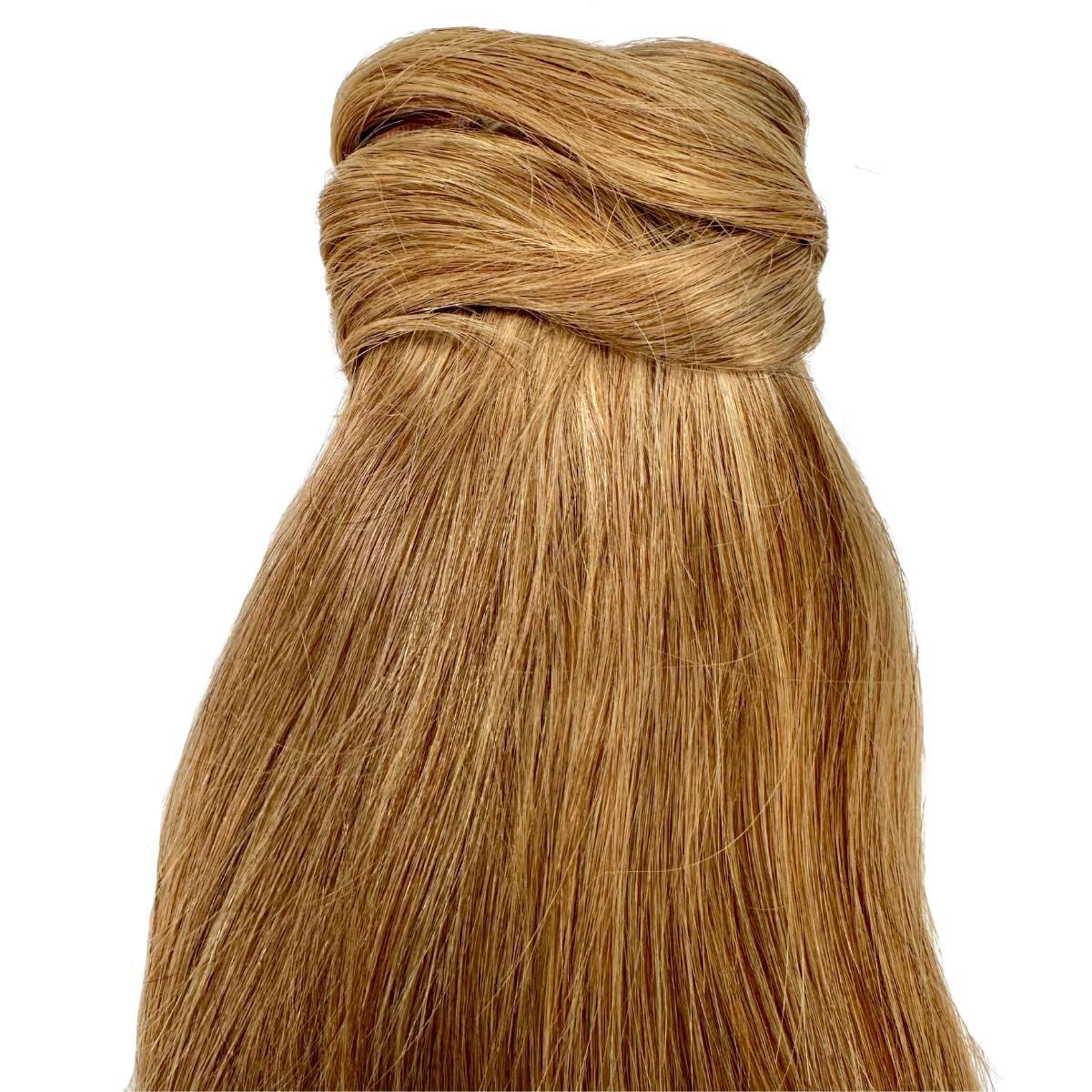 Close-up of Honey Blonde silky hair texture and color HookedOnBundles Virgin Hair