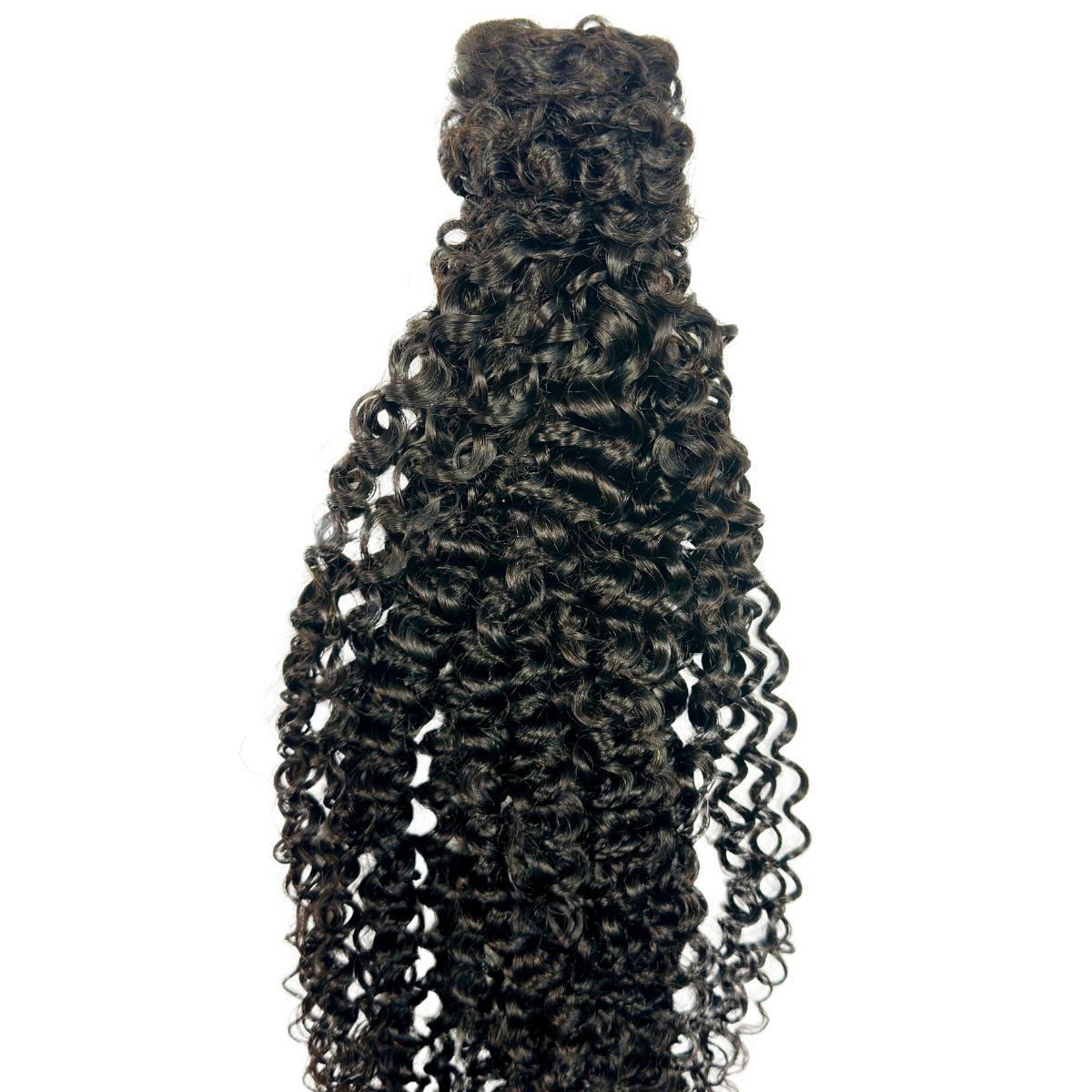 Side view showing length of Kinky Curly Ponytail Extension HookedOnBundles Virgin Hair