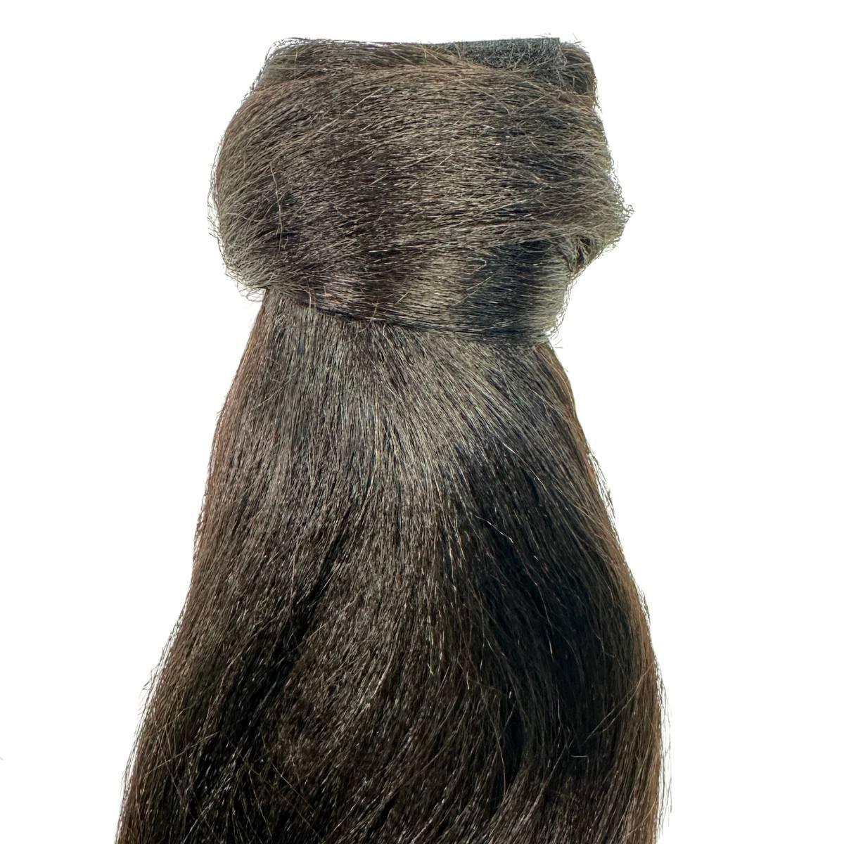 Close-up of Yaki Straight relaxed-texture hair finish HookedOnBundles Virgin Hair